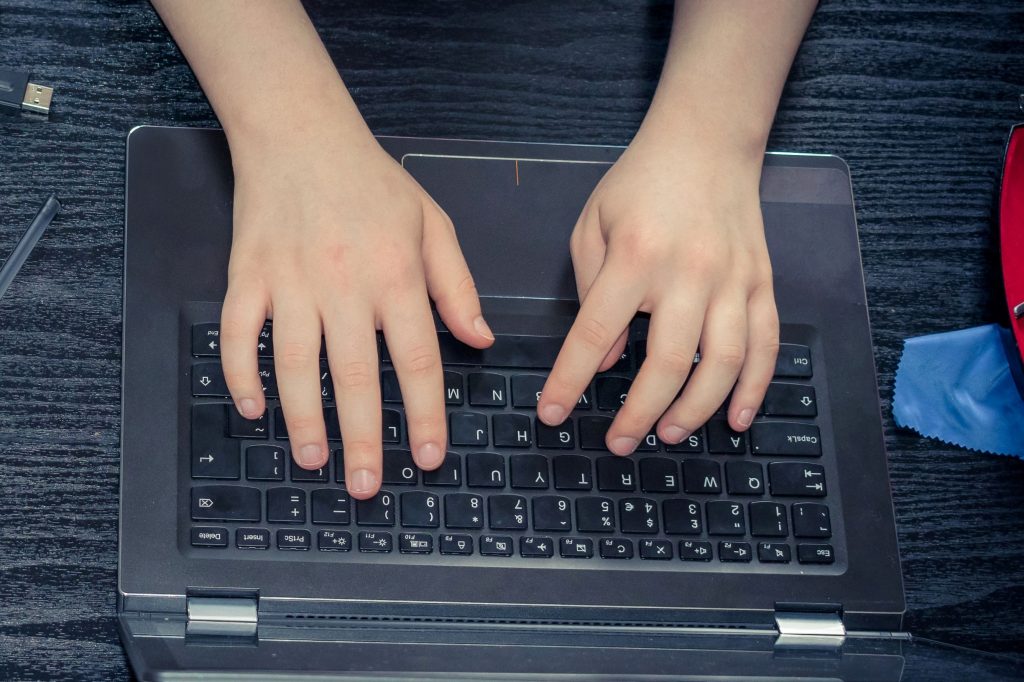 Photo of a student using a laptop